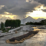 sunset or sunrise over mountains in the background